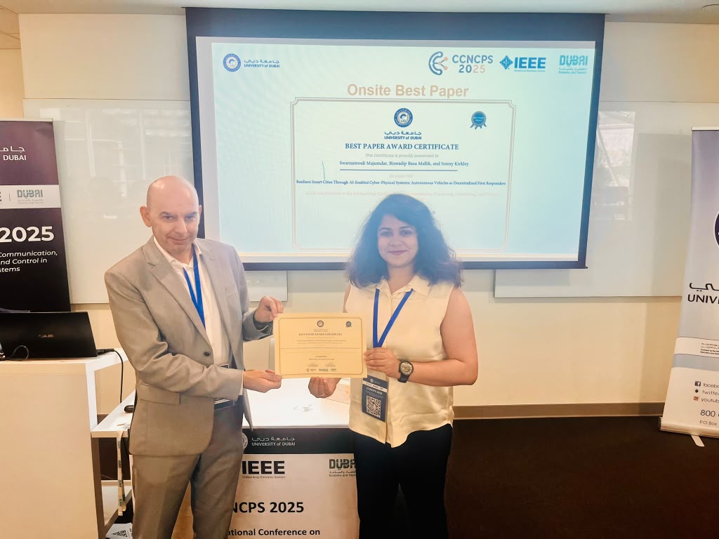 Swarnamouli Majumdar receiving the Onsite Best Paper award certificate at CCNCPS 2025 at the University of Dubai.