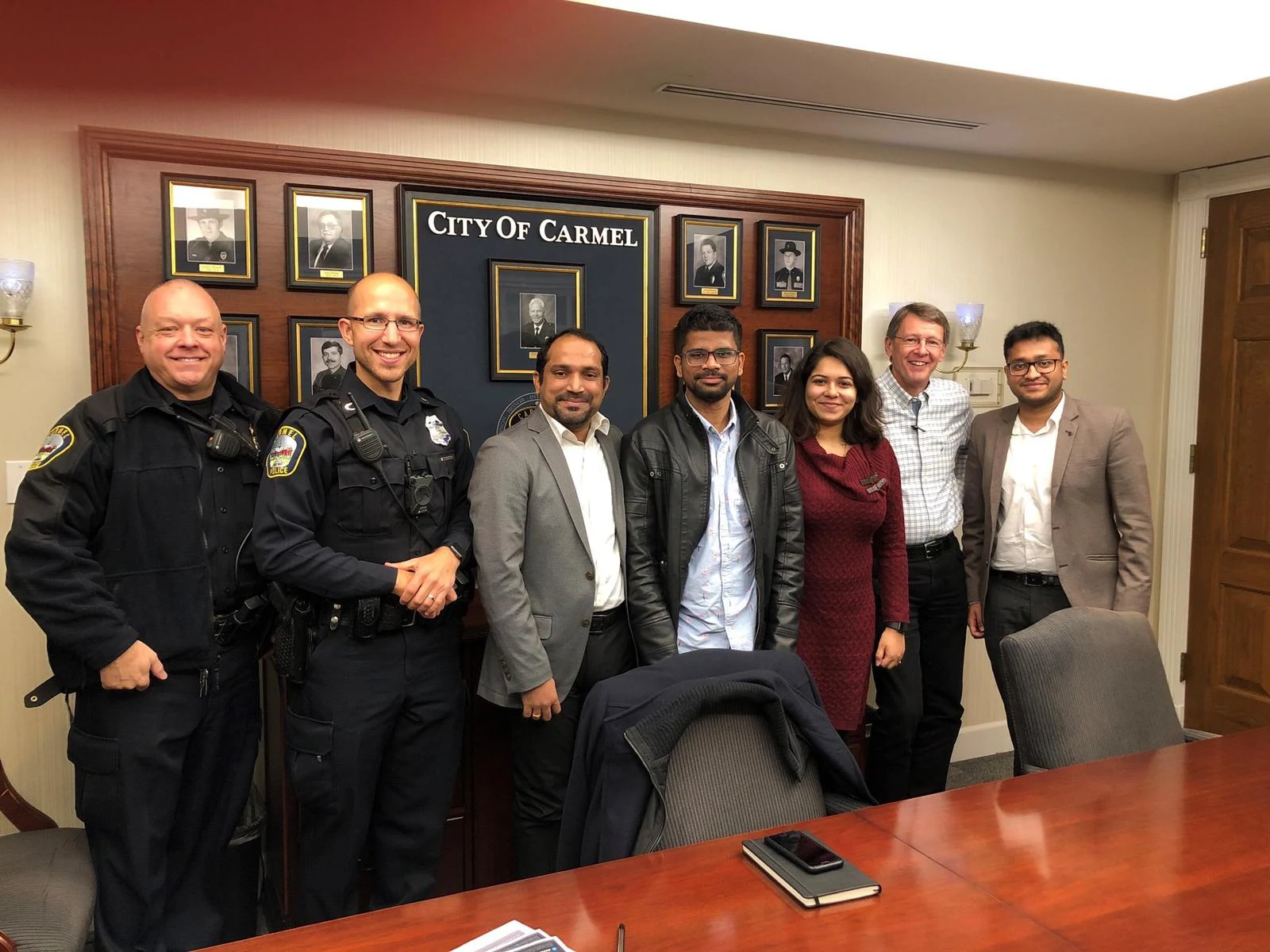 Zenext team members in a stakeholder conversation with public-safety personnel in Carmel, Indiana.